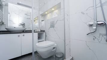 Hair dryer, towels, soap, shampoo