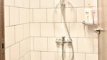 Comfort House | Bathroom | Hair dryer, slippers