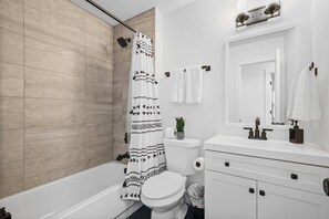 Hair dryer, towels, soap, shampoo