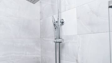 Shower, towels, soap, shampoo