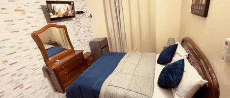 2 chambres, coffres-forts dans les chambres, fer et planche Ă repasser