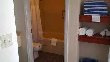 Hair dryer, towels, soap, shampoo