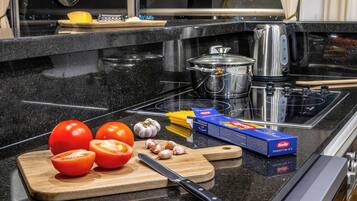 Apartment | Private kitchen | Full-size fridge, microwave, oven, stovetop