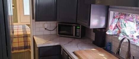 Fridge, microwave, coffee/tea maker, toaster