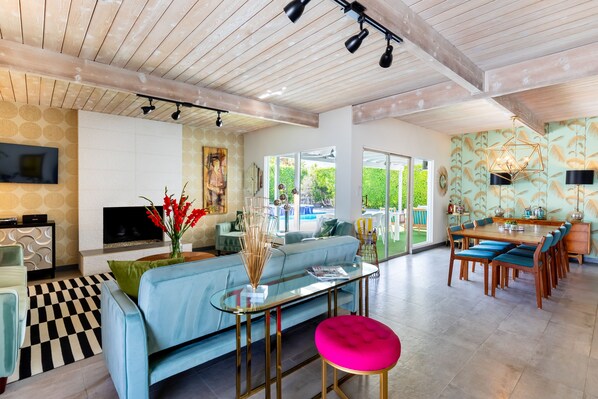 Smart TV, fireplace, books, music library