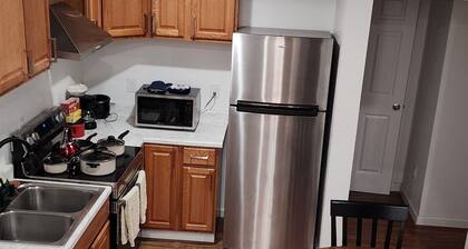 Cozy and Neat house in a quite and safe neighborhood, very friendly hosts!!