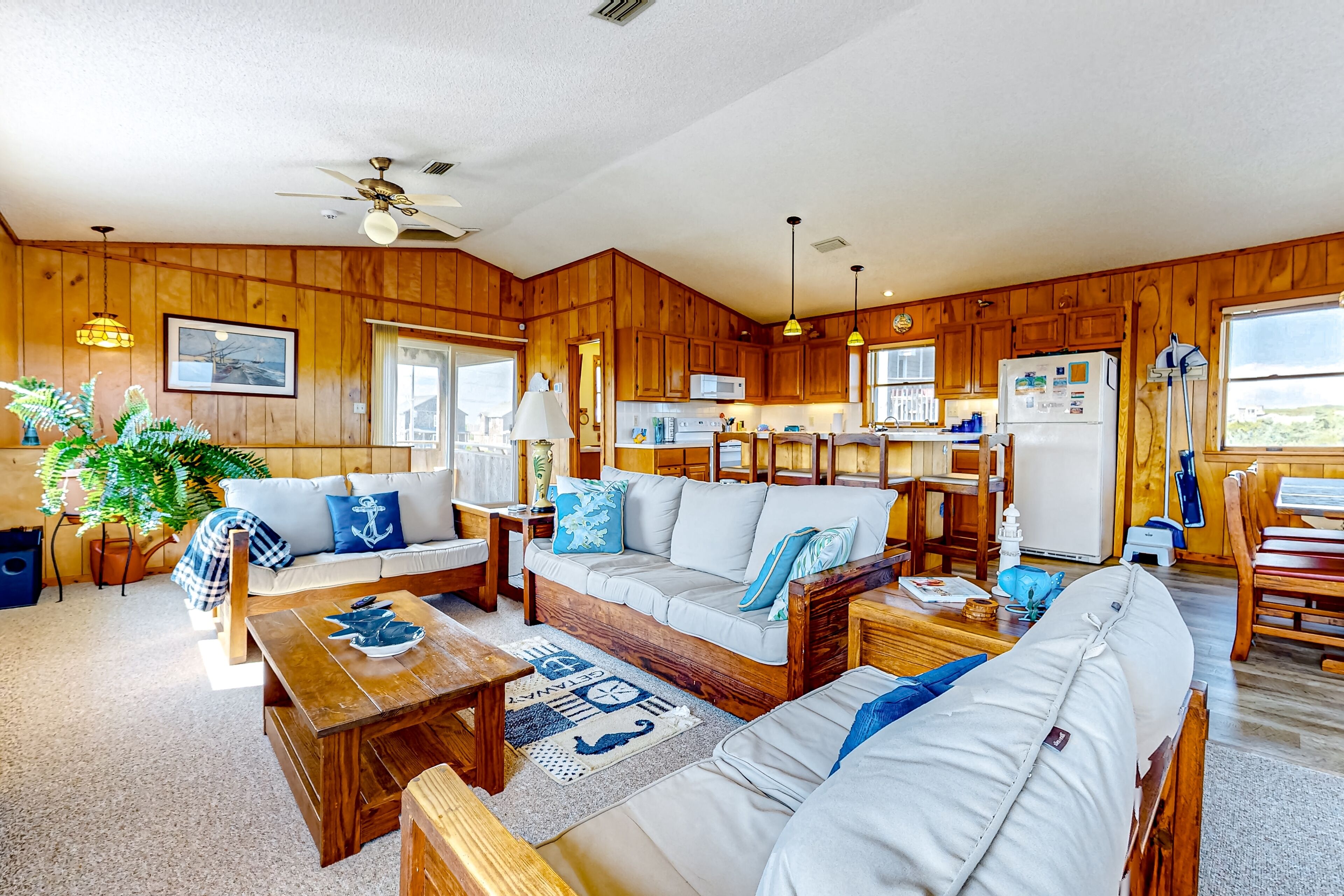 Charming water view home with pool access, decks & outdoor shower - dog-friendly