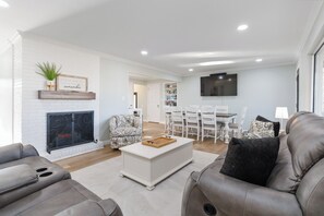 Smart TV, fireplace, books