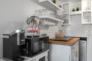 Fridge, microwave, stovetop, coffee/tea maker