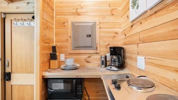 Fridge, microwave, stovetop, coffee/tea maker