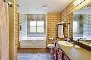 Secadora de cabello, toallas, papel de baño 