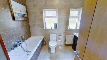 Deluxe Villa | Bathroom | Hair dryer, towels, soap, toilet paper