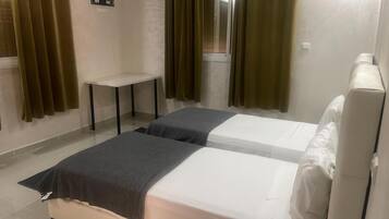 1 quarto, berço de viagem, Wi-Fi de cortesia, roupa de cama