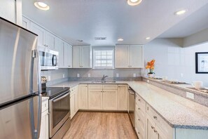 Fridge, microwave, stovetop, dishwasher - Outer Banks NC | Family Beach Adventure | Pool & Waterpark | 2BR (Kitty Hawk)