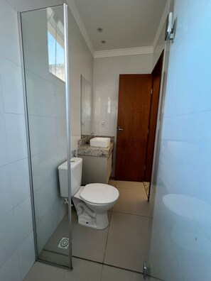 Bidet, towels, toilet paper