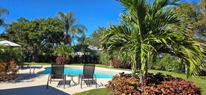 Outdoor pool, a heated pool - Private Heated Pool-Hot Tub-Fire Pit-Tiki Bar-Large Yard-Great Location! (Naples)