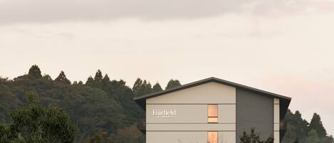 A modern building with the text "Fairfield by Marriott" on its facade.