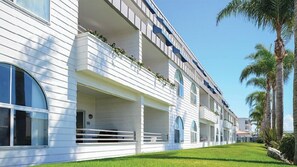 Guests can enjoy stunning views from the spacious balconies with potted plants.
