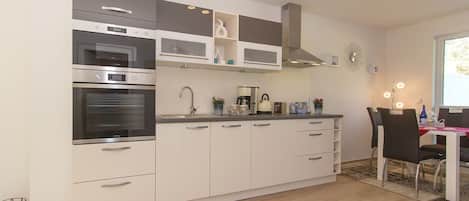 Oven, stovetop, dishwasher, coffee/tea maker