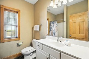 Shower, towels, soap, toilet paper