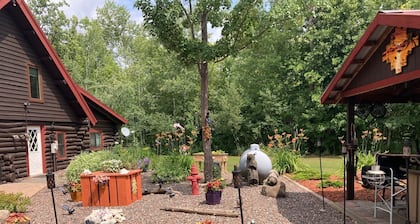 Custom built log home on 40 acres & in the woods!
Snowmobile right from home!