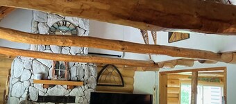 Custom built log home on 40 acres & in the woods!
Snowmobile right from home!