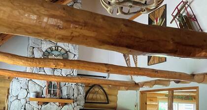 Custom built log home on 40 acres & in the woods!
Snowmobile right from home!