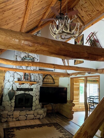 Custom built log home on 40 acres & in the woods!
Snowmobile right from home!