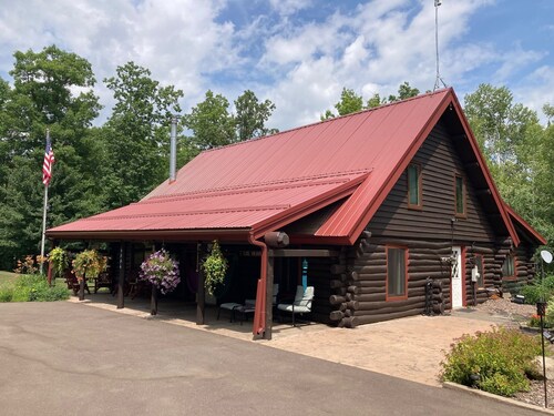 Custom built log home on 40 acres & in the woods!
Snowmobile right from home!