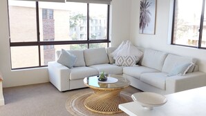 Living area - Large 2 bed unit with water views of Shoal Bay Beach! (Nelson Bay)