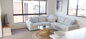 Living area - Large 2 bed unit with water views of Shoal Bay Beach! (Nelson Bay)