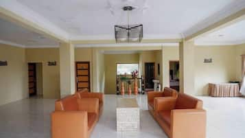 Superior Double or Twin Room | Living area | Flat-screen TV