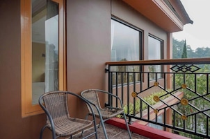 Superior Double or Twin Room | Living area | Flat-screen TV