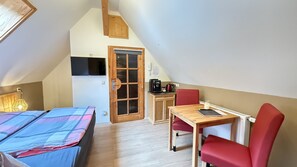 Een strijkplank/strijkijzer, gratis wifi, beddengoed