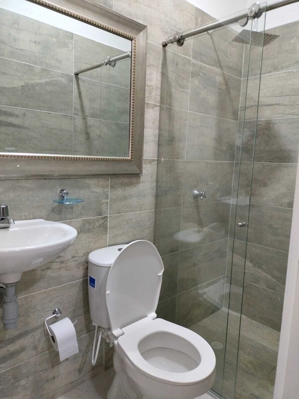 comfort double room, 1 queen bed, garden view, ground floor | bathroom | shower, rainfall showerhead, towels, soap