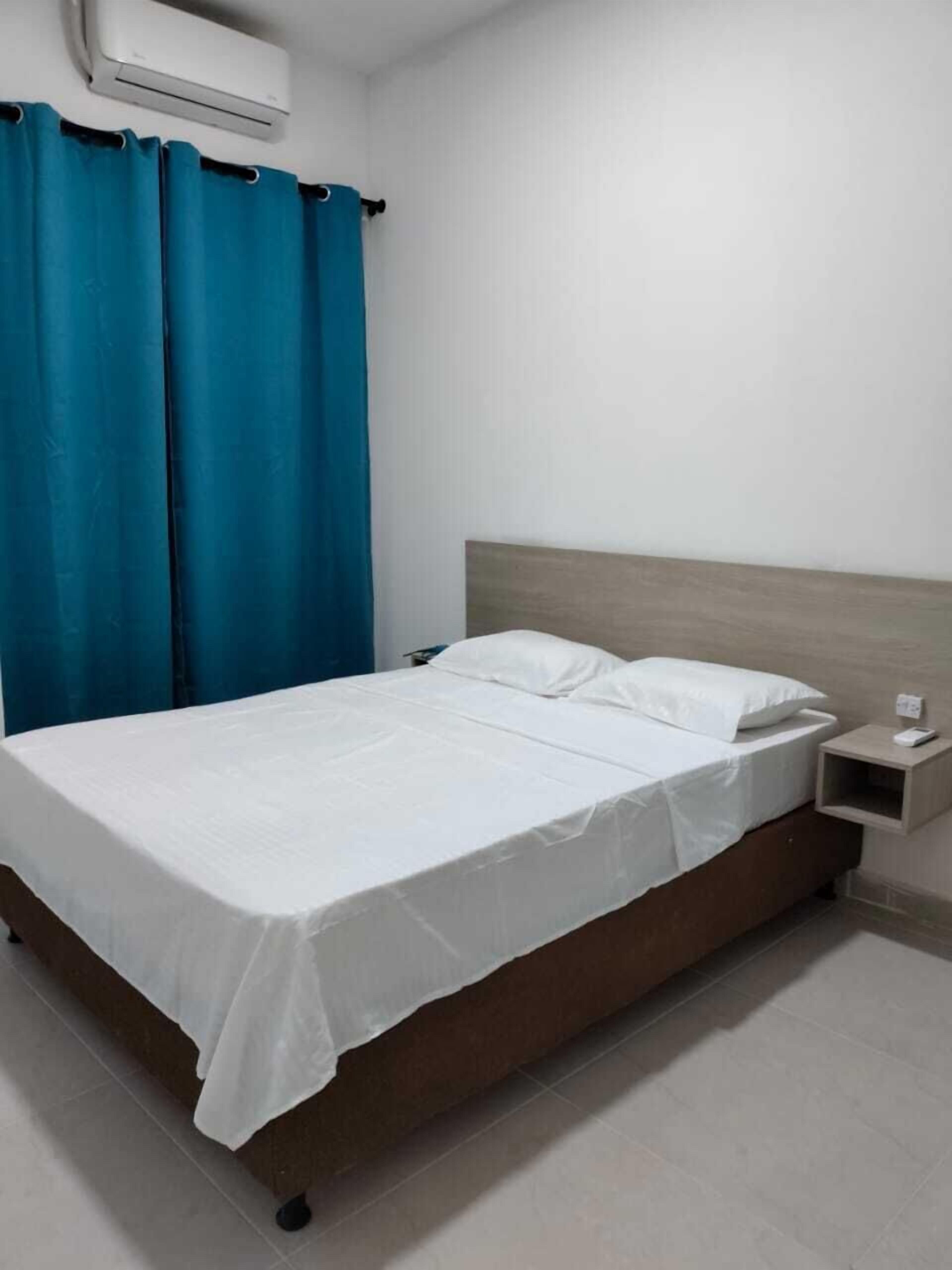 family apartment, multiple beds, garden view | premium bedding, minibar, blackout curtains, free wifi