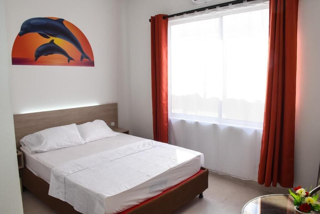 comfort double room, 1 queen bed, garden view, ground floor | premium bedding, minibar, blackout curtains, free wifi