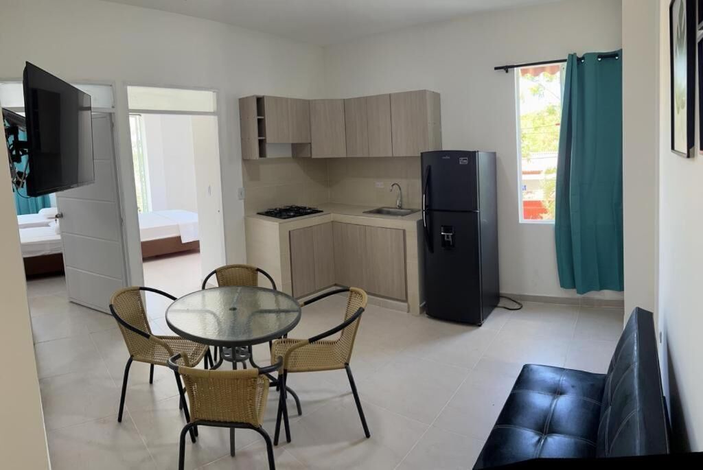 fridge, microwave, cookware/dishes/utensils