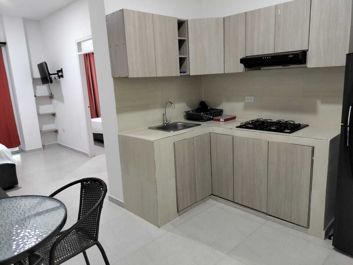 fridge, microwave, cookware/dishes/utensils