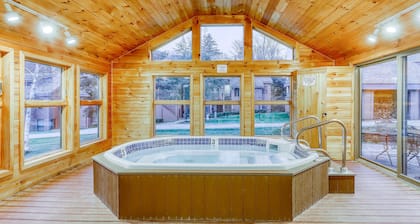 Two-story, walk-to-lift condo with indoor pool, hot tub, sauna, gym & game room
