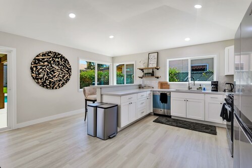 Dog-friendly home with pool, spa, enclosed yard, covered lanai, & fireplace