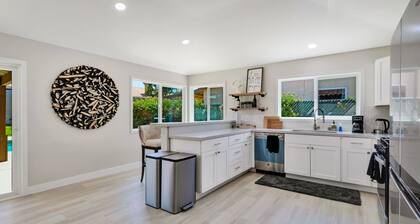 Dog-friendly home with pool, spa, enclosed yard, covered lanai, & fireplace