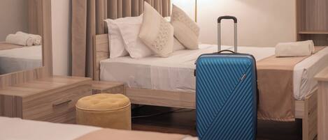 Deluxe Quadruple Room | Individually furnished, desk, blackout drapes, iron/ironing board