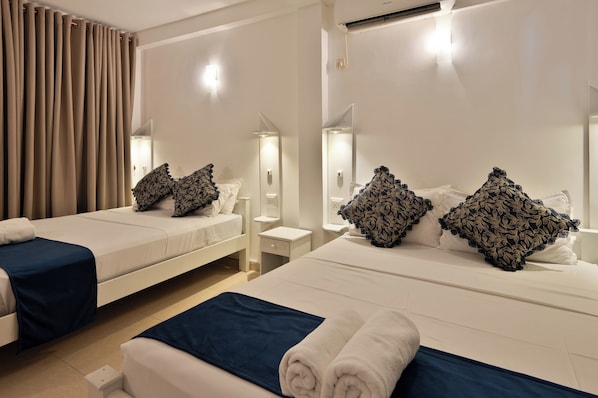 Chambre Quadruple Deluxe