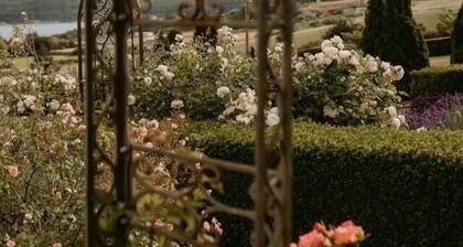 Lovely water and garden views. Two minutes drive to beaches, six to either town!