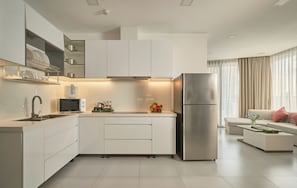 2-Bedroom Apartment City View | Private kitchen | Fridge, microwave, stovetop, electric kettle