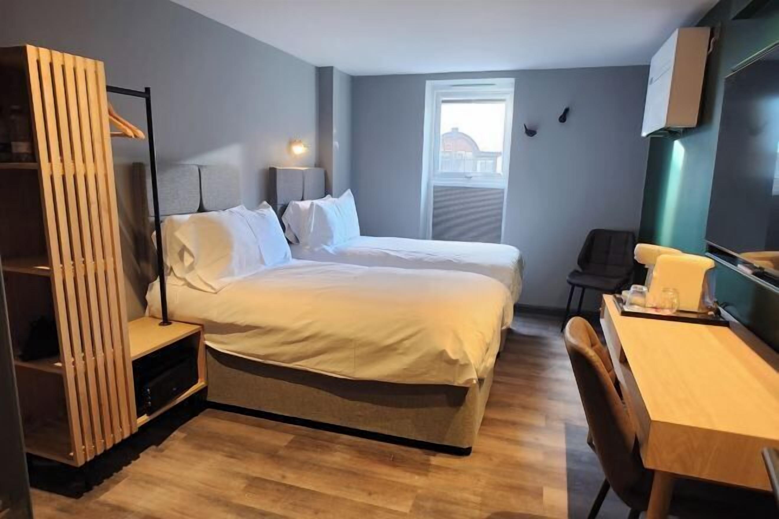 Premium bedding, Select Comfort beds, desk, laptop workspace