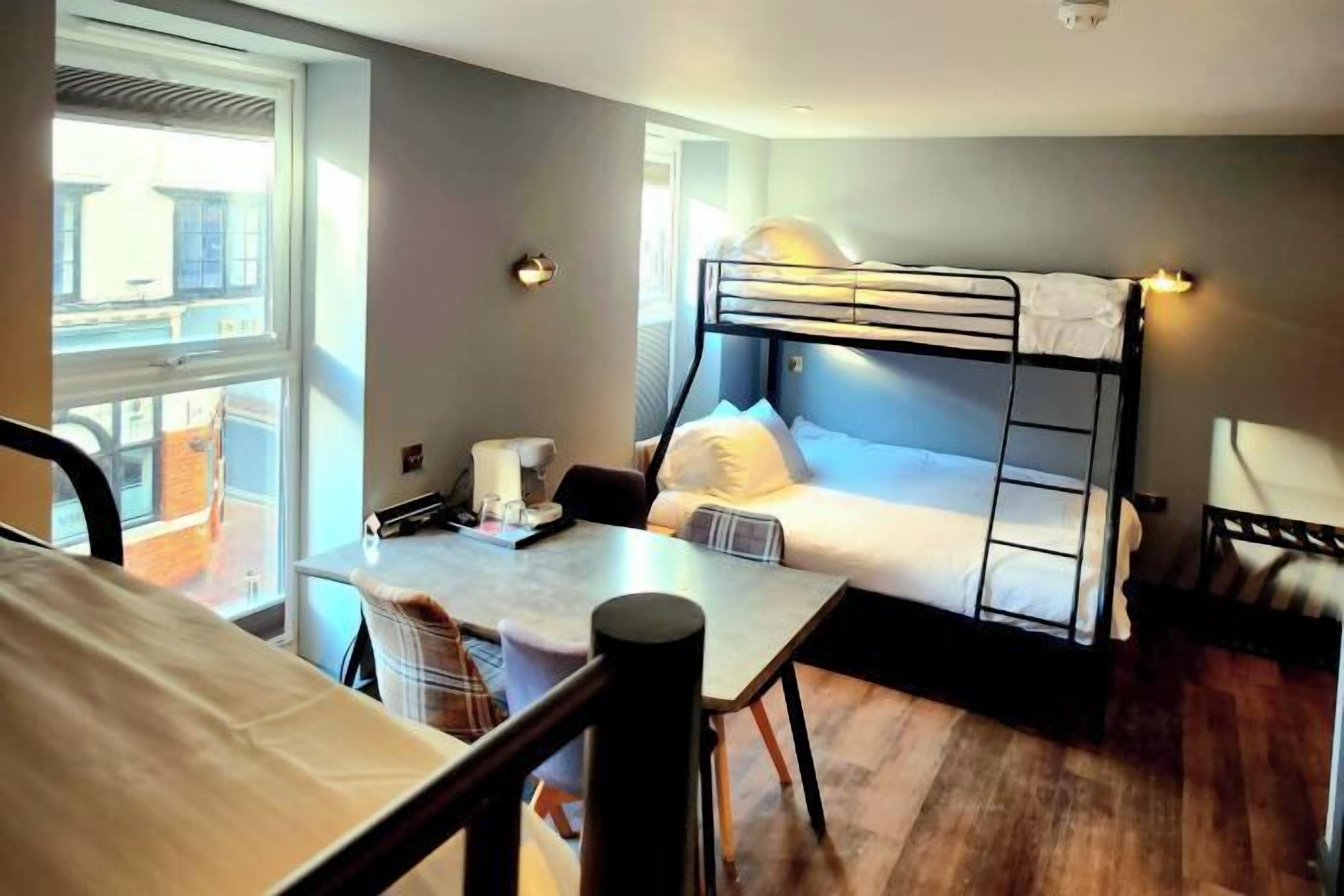 Premium bedding, Select Comfort beds, desk, laptop workspace