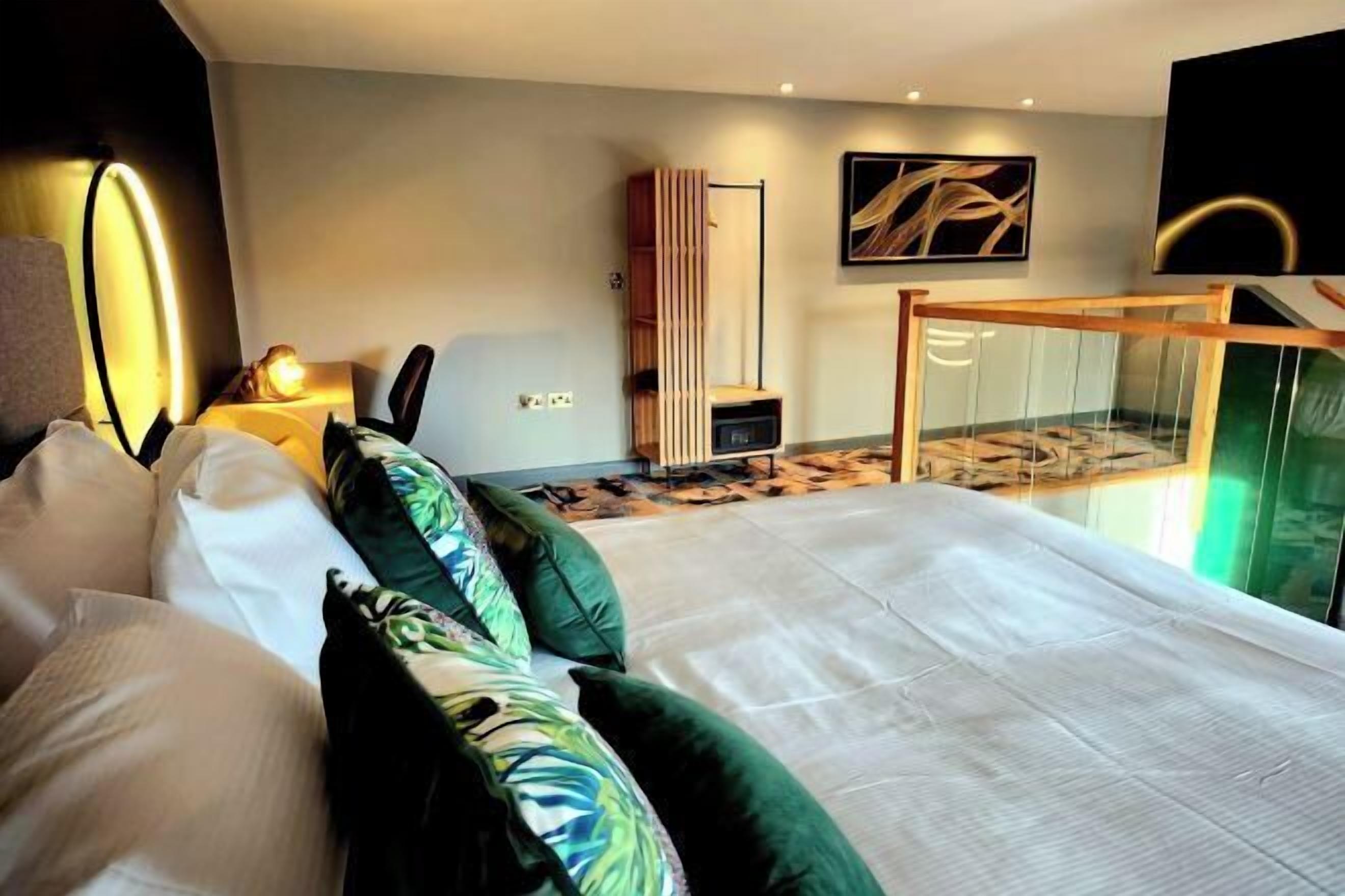 Premium bedding, Select Comfort beds, desk, laptop workspace