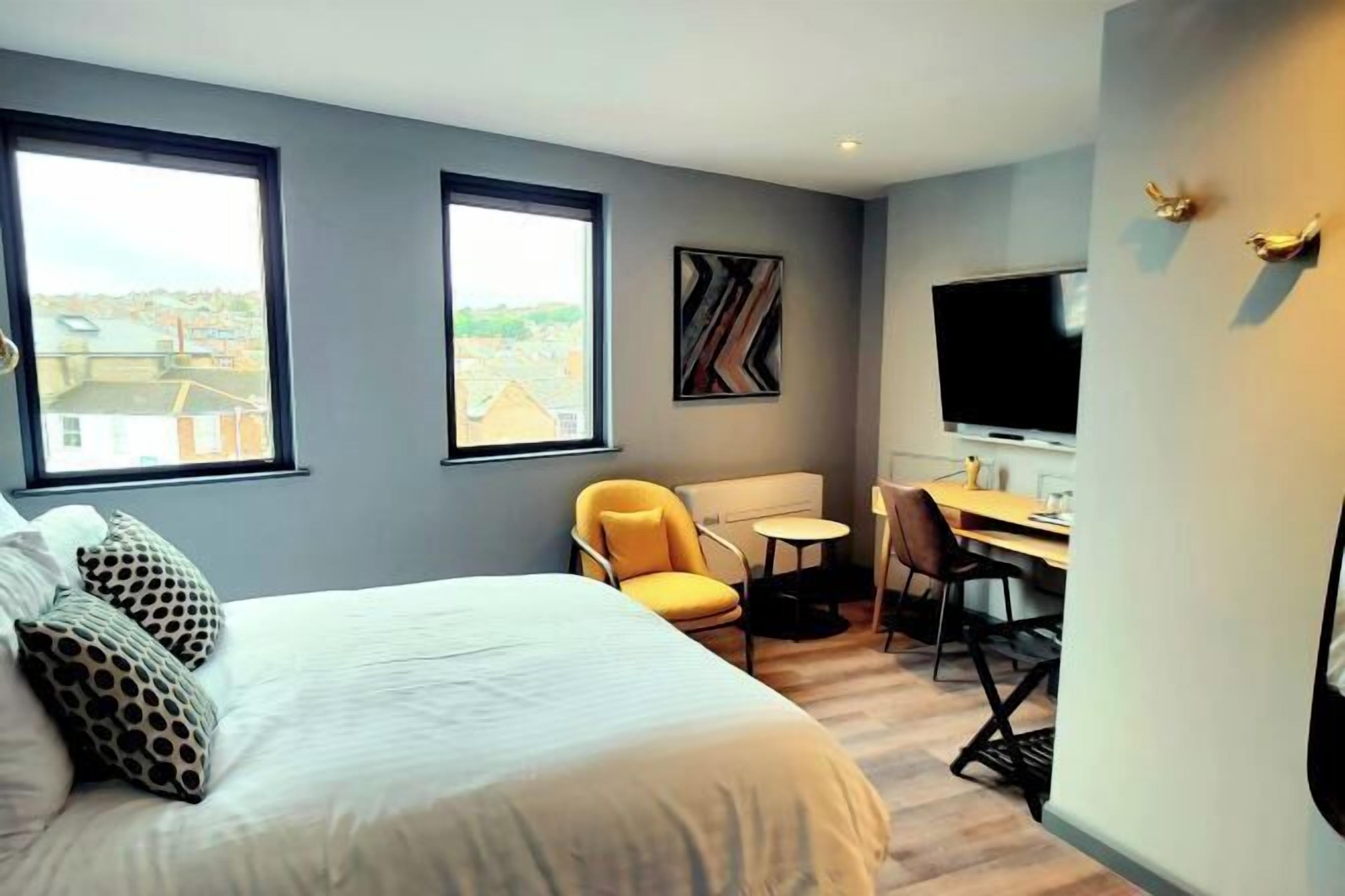 Premium bedding, Select Comfort beds, desk, laptop workspace